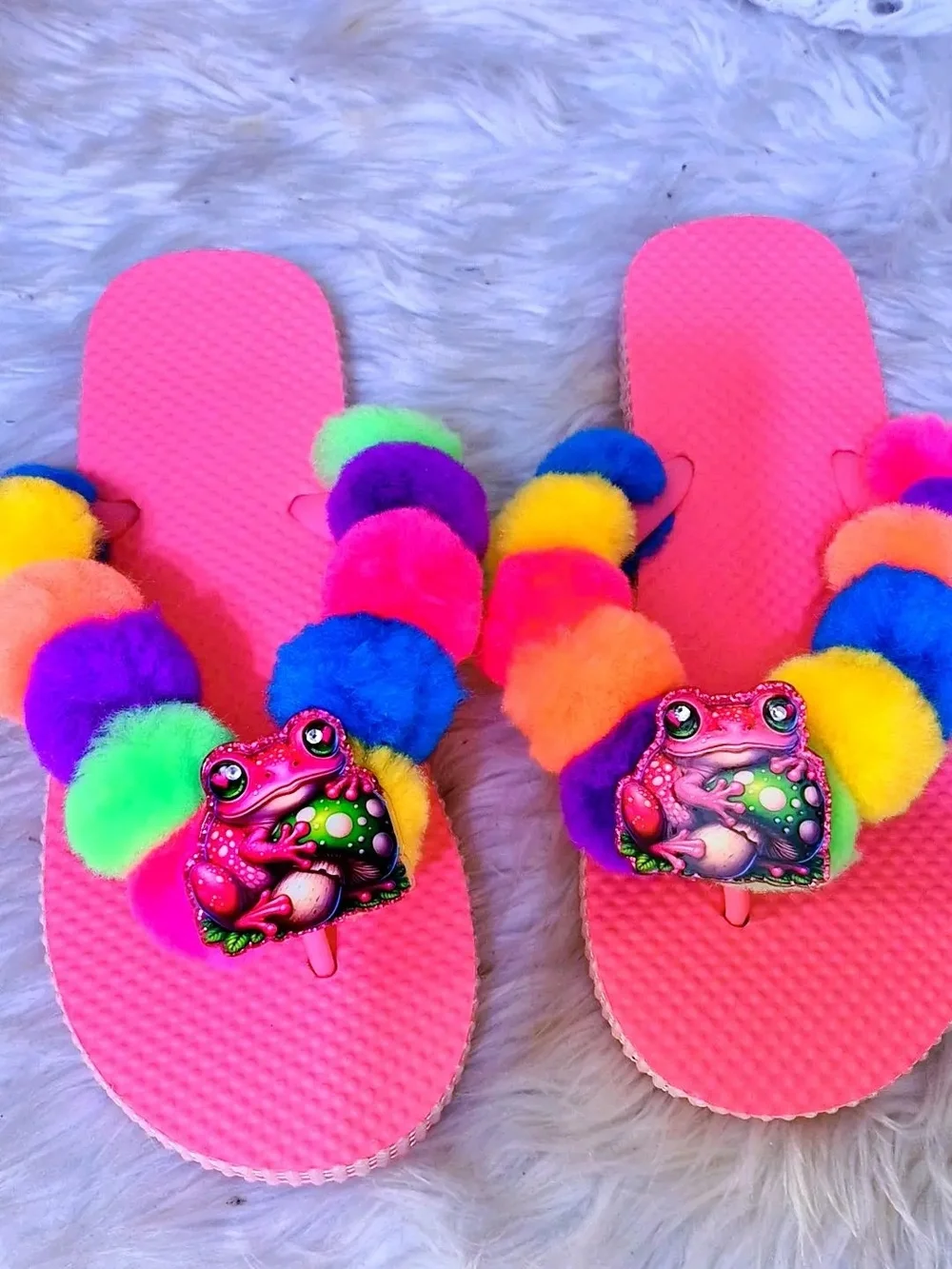 Kids Pink Rainbow Pom-Pom Flip Flops with Frog Accent